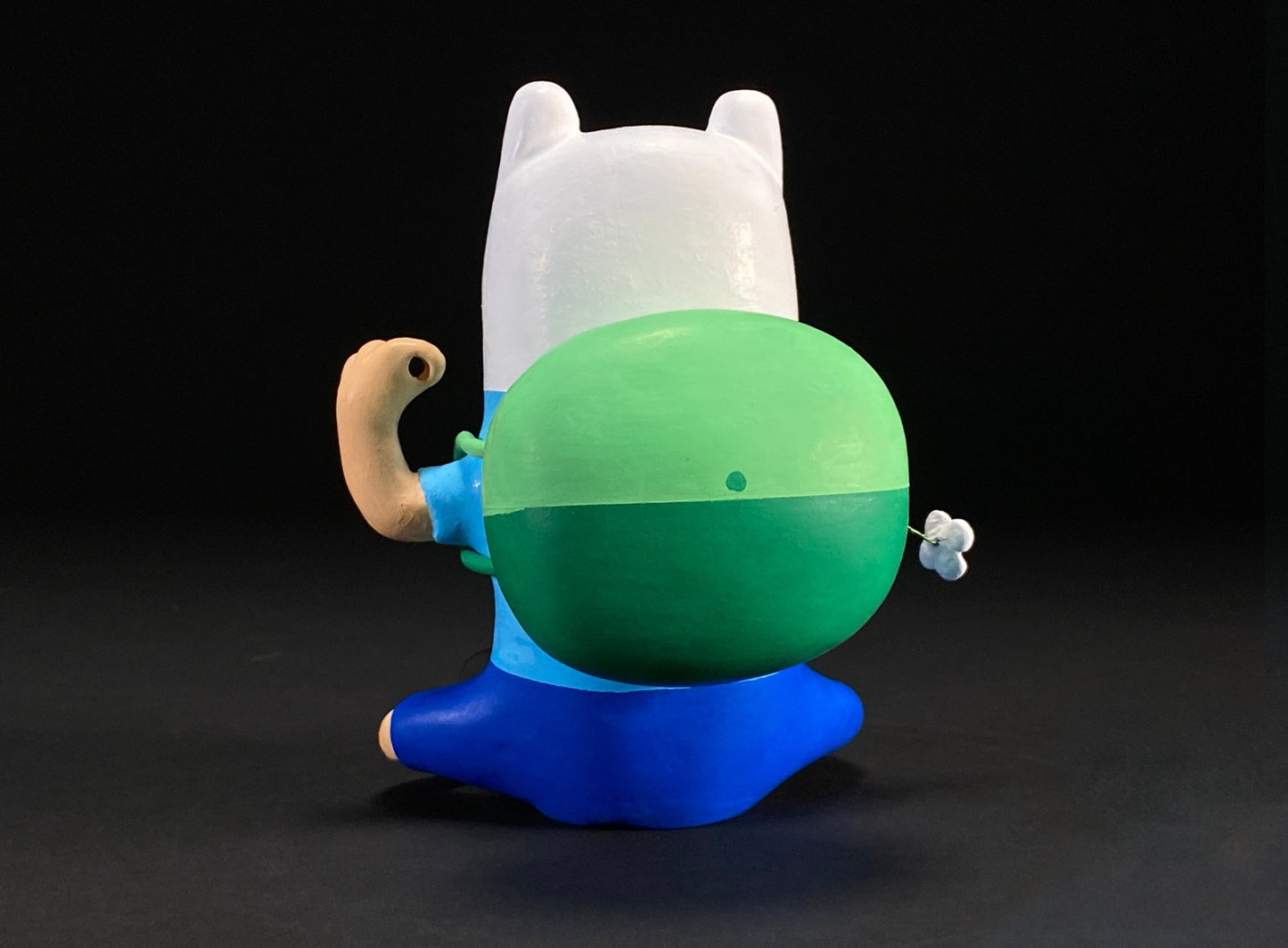 Back view of Finn statue really showing the backpack.