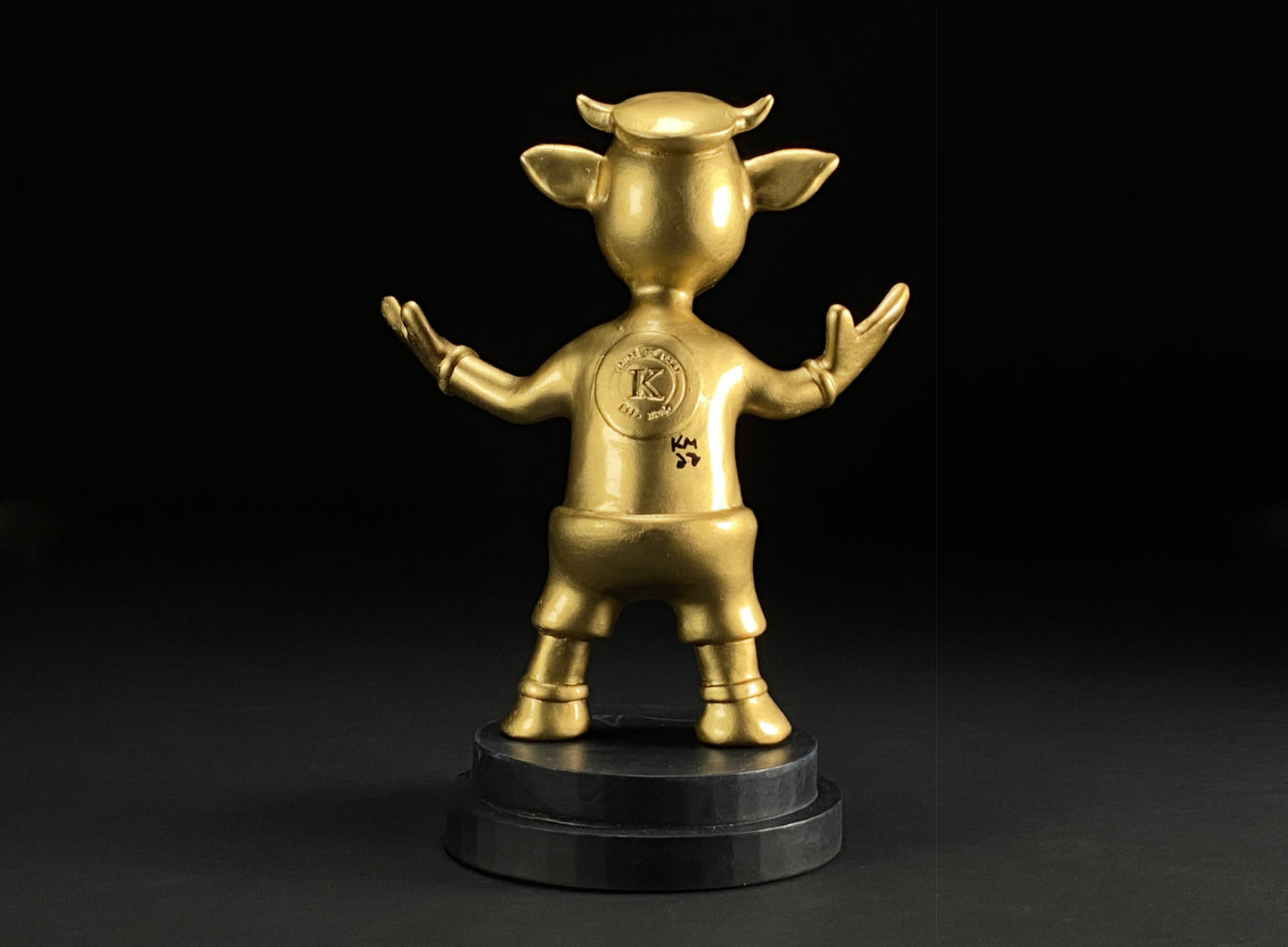 Rear view of Mooby the Golden Calf statue