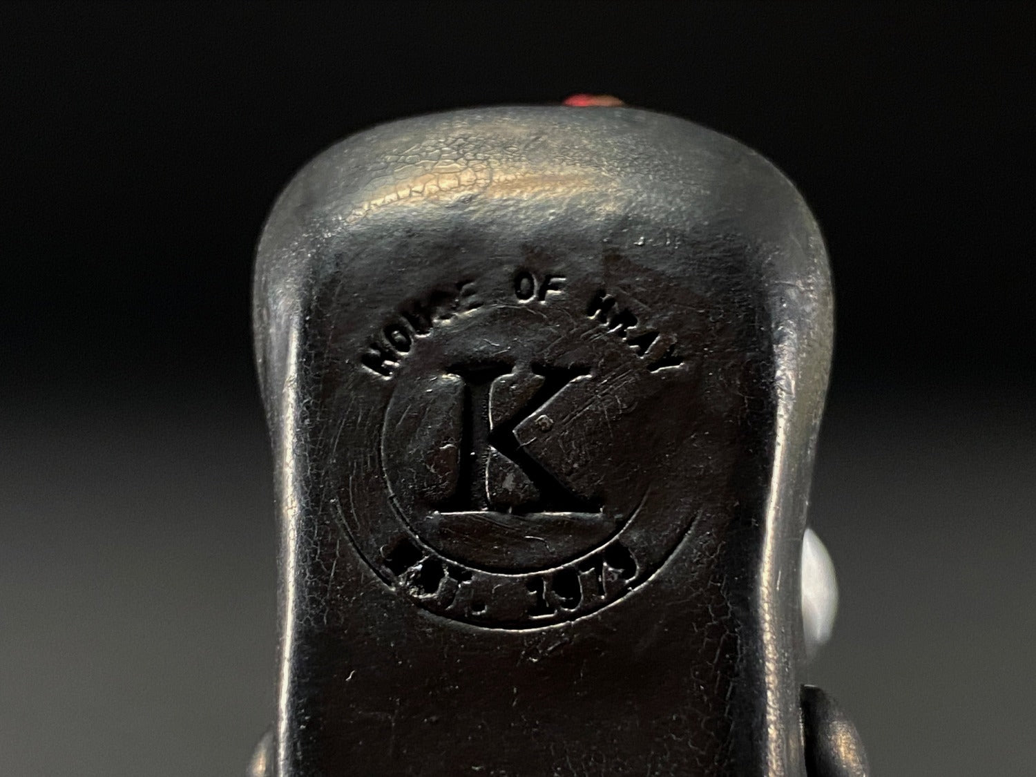 Closeup of House of Kray stamp on bottom of toy.
